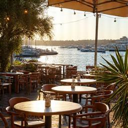 Outdoor outdoor seating with harbor views at Harbourview Café